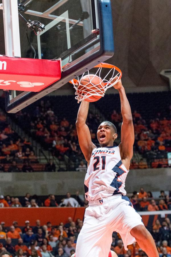 Illinois Malcolm Hill throws down a two-handed dunk during the game against Rutgers at the State Farm Center on February 17. The Illini won 82-66.