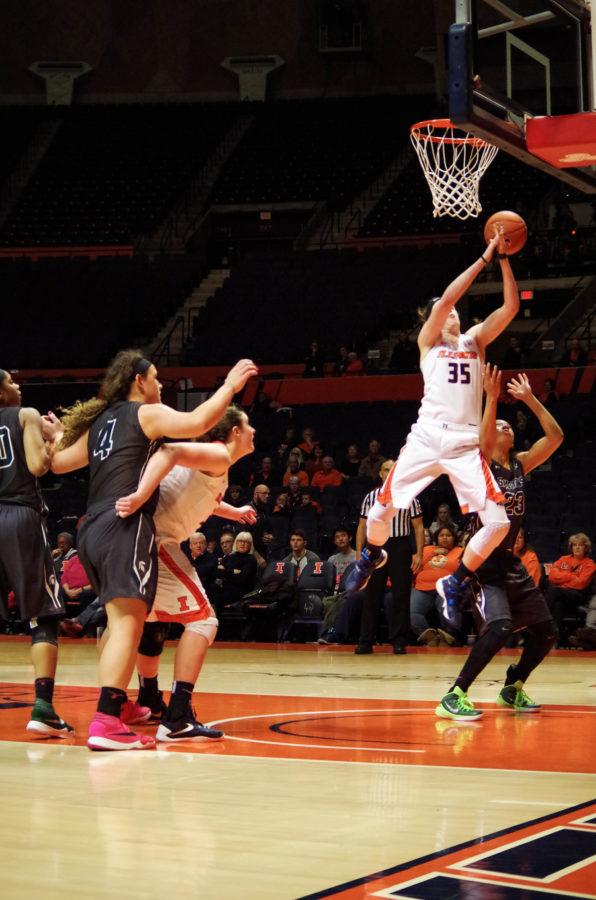 All eyes are on Illinois Alex Wittinger (35), as she goes up for the layup at the game against Michigan State at State Farm Center on Wednesday, Feb. 24th, 2016. The Illini lost 43-71.