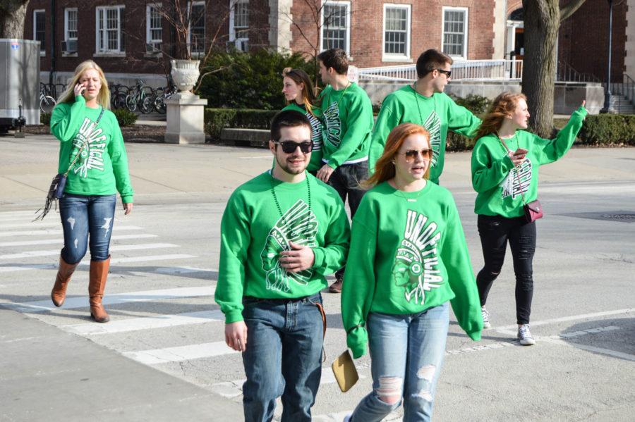 Students celebrate Unofficial by wearing green on Wright St.  on Friday, March 4, 2016.