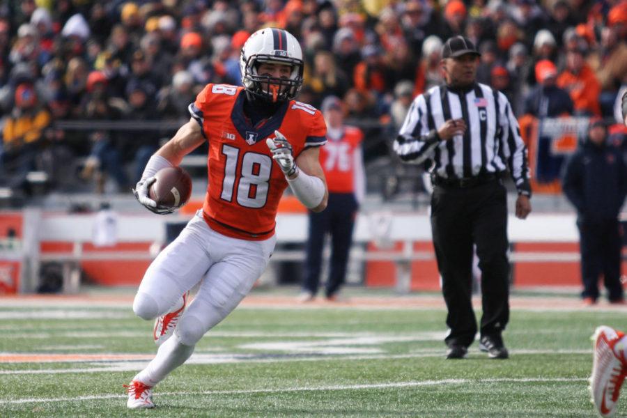 Illinois Mike Dudek runs the ball during the game against Iowa at Memorial Stadium on Nov. 15, 2014. After missing the 2015 season, Dudek will be out for the 2016 campaign with a torn ACL.
