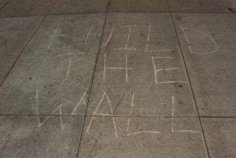The Trump slogan chalked on the sidewalk on the Quad at the University of Illinois Urbana-Champaign on Tuesday, April 5, 2016.