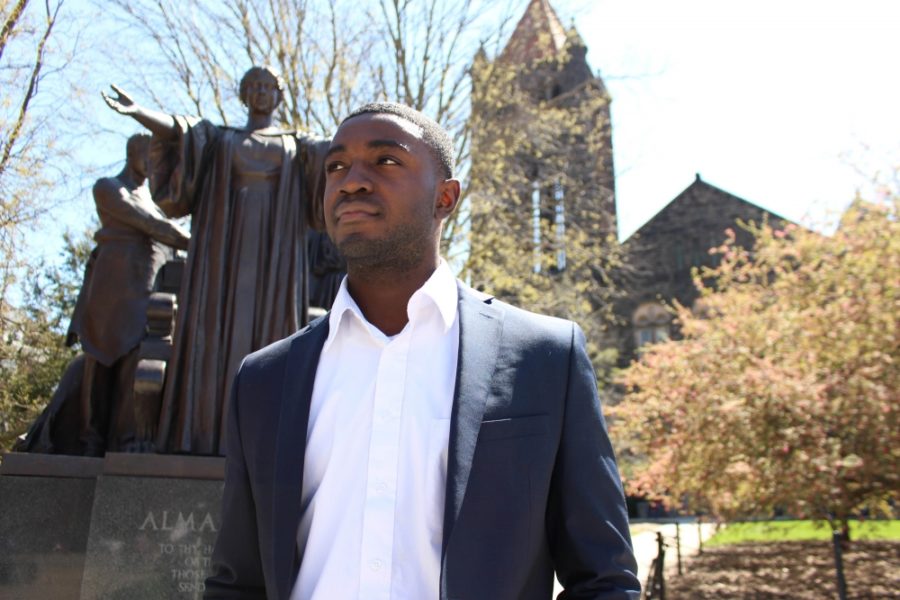 Newly elected student body president Ron Lewis in front of the Alma Mater on Wednesday, Apr. 13, 2016.