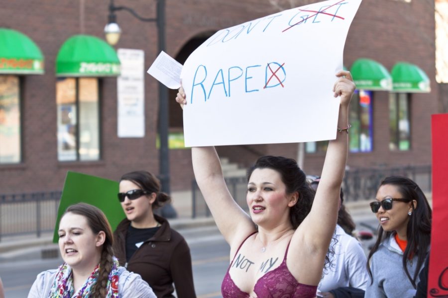 Katarina Spungen, a sophmore in FAA and member of Amnesty International 124, participates in the 2013 Slut Walk to call awareness to sexual assault.