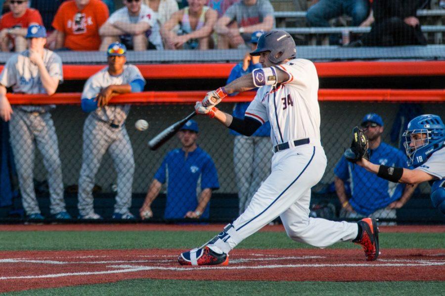 Illinois’ Jason Goldstein makes solid contact with the ball during game one of the series against St. Louis University at Illinois Field on Friday, April 15. The Illini won 6-4.