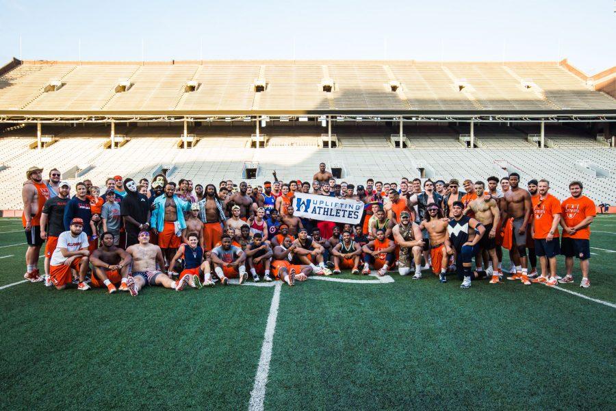 Group photo of the athletes during the fifth annual Lift for Life event. Lift for Life is a fundraising weight-lifting competition to fight against rare diseases. The event was held at the Memorial Stadium on UI campus on Friday, June 30, 2016.