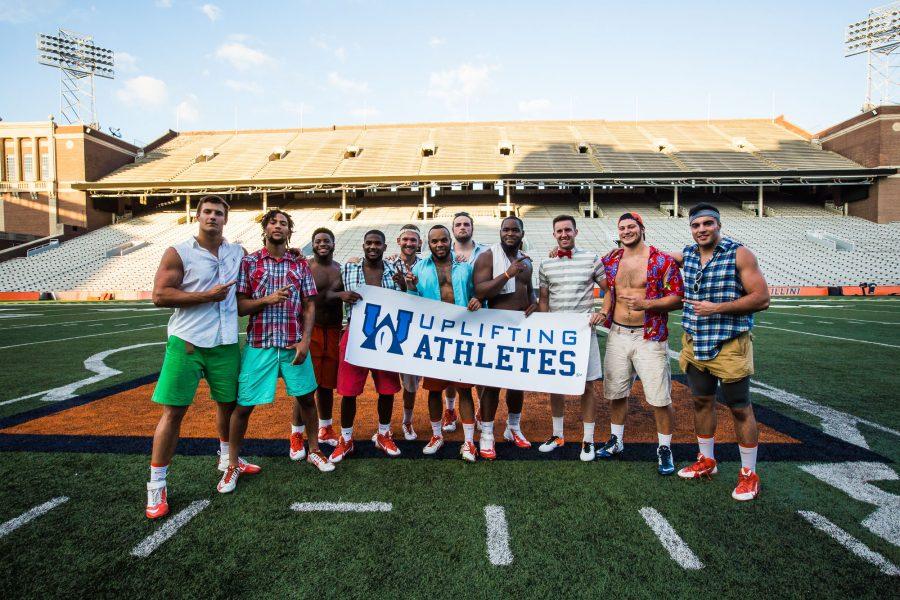 Group photo of the winning Red team during the fifth annual Lift for Life event. Lift for Life is a fundraising weight-lifting competition to fight against rare diseases. The event was held at the Memorial Stadium on UI campus on Friday, June 30, 2016.