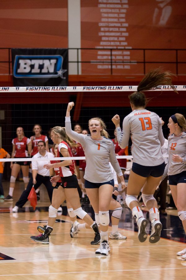 Illinois Jordan Poulter celebrates after a kill during the match against Wisconsin at Huff Hall on Wednesday, Nov. 18, 2015. Illinois lost 3-2.