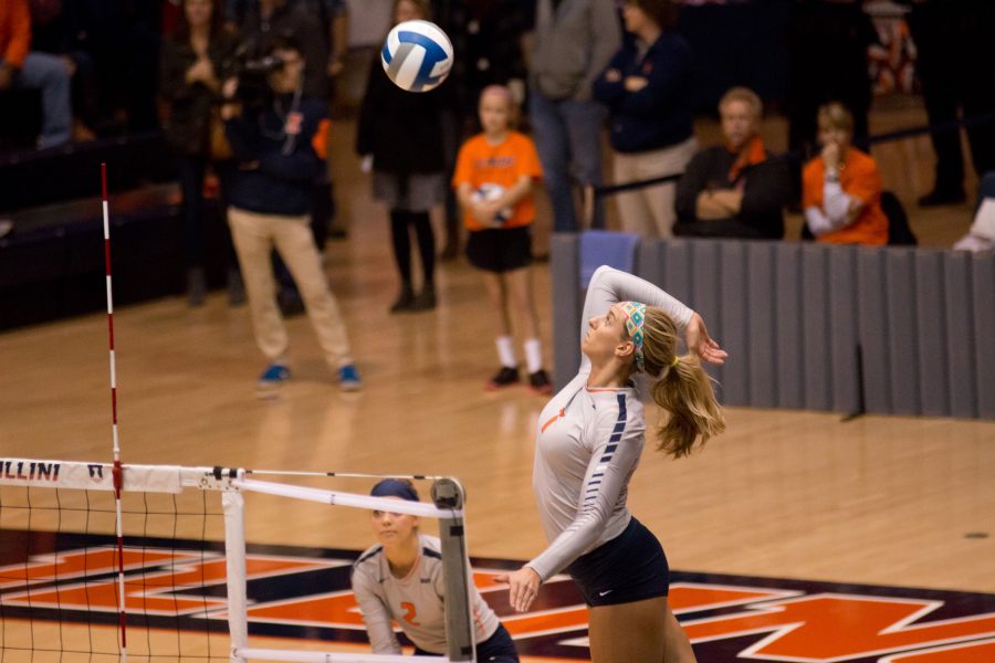 Former Illinois Jocelynn Birks gets ready to spikes the ball during the match against Wisconsin at Huff Hall on Wednesday, Nov. 18, 2015.