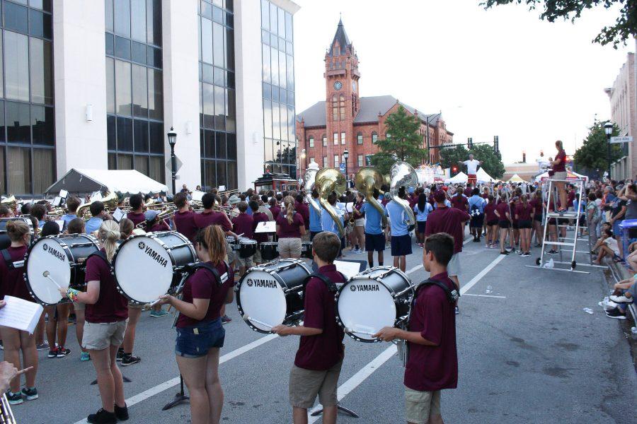 Local school marching bands perform at the Urbana Sweetcorn Festival in downtown Urbana on Saturday, Aug. 27