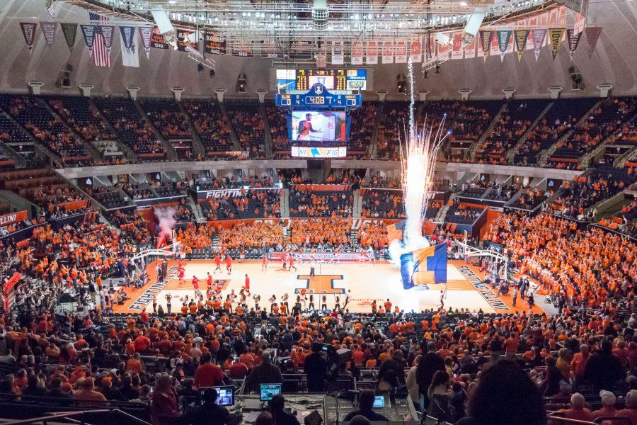 Fireworks go off as the Illinois basketball team comes onto the floor before the game against Ohio State at the State Farm Center on Thursday, January 28. The Illini lost in overtime 68-63.