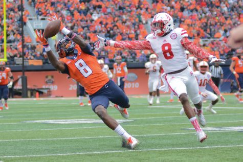 Illinois Geronimo Allison attempts to catch the ball during the game against Nebraska at Memorial Stadium on Oct. 3, 2015. 