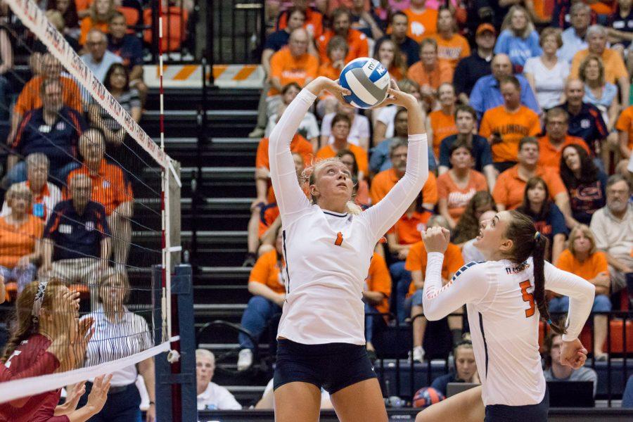 Illinois+setter+Jordyn+Poulter+%281%29+sets+the+ball+to+Ali+Bastianelli+%285%29+during+the+match+against+Arkansas+at+Huff+Hall+on+Friday%2C+August+26.+The+Illini+won+3-0.
