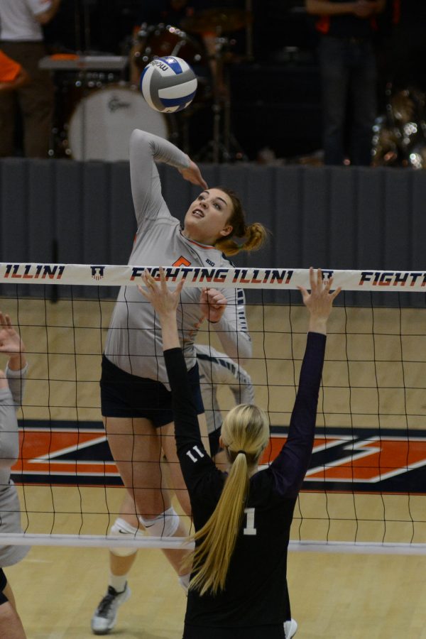 Illinois Ali Bastianelli (5) attempts to spike the ball during the match against Northwestern at Huff Hall on Saturday, Nov. 7, 2015. Illinois won 3-1.