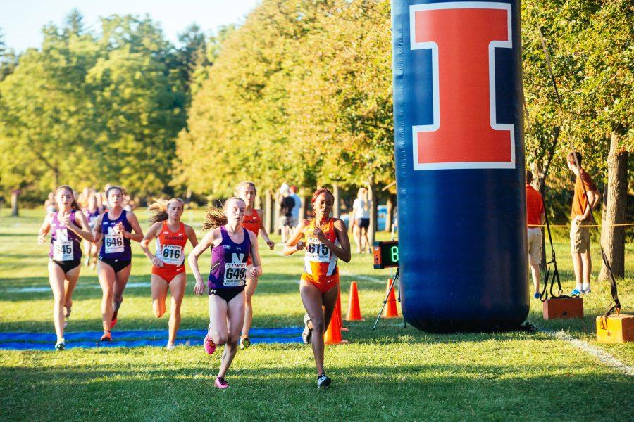 Denise Branch leading the team during the womens cross-coutry Illini Challenge. The challenge was held at the UI Arboretum on Friday, September 2, 2016. As one of the three Fighting Illinis to place in top 10, Denise led the way in fifth place.