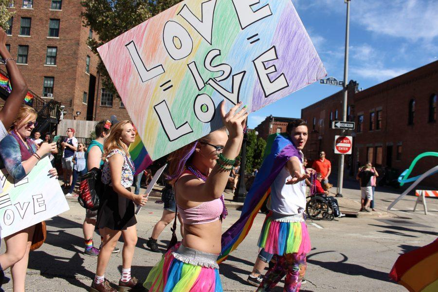 Parade attendees dress up and carry handmade signs in the CU Pride Parade last year. Parade Chair Josh Laskowski said last years parade was the best one yet, but has high hopes for the future. 