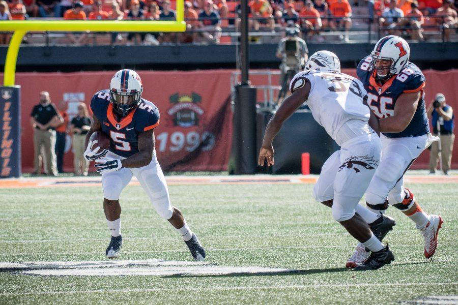 Illinois running back KeShawn Vaughn (5) tries to run the ball down the sideline during the game against Western Michigan at Memorial Stadium on Saturday, September 17. The Illini lost 34-10.