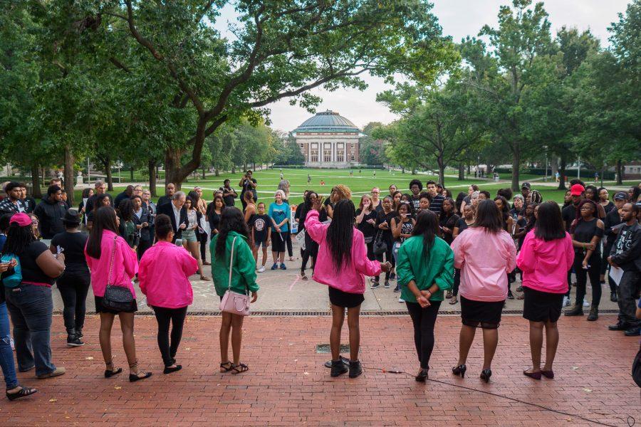 Participants of the Black Lives Matter rally regarding the shooting the Charlotte gather on the Main Quad to show support for shooting victims on Sept. 25.