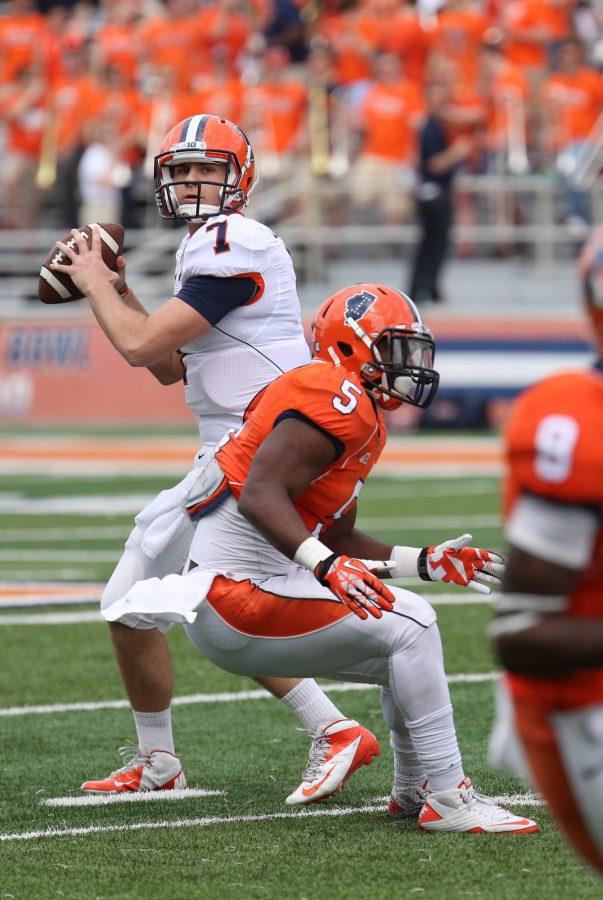 Illinois Chayce Crouch (7) winds up for a pass during the annual Orange and Blue Spring Game at Memorial Stadium, on Saturday, April 13, 2014. The Blue team won 38-7.