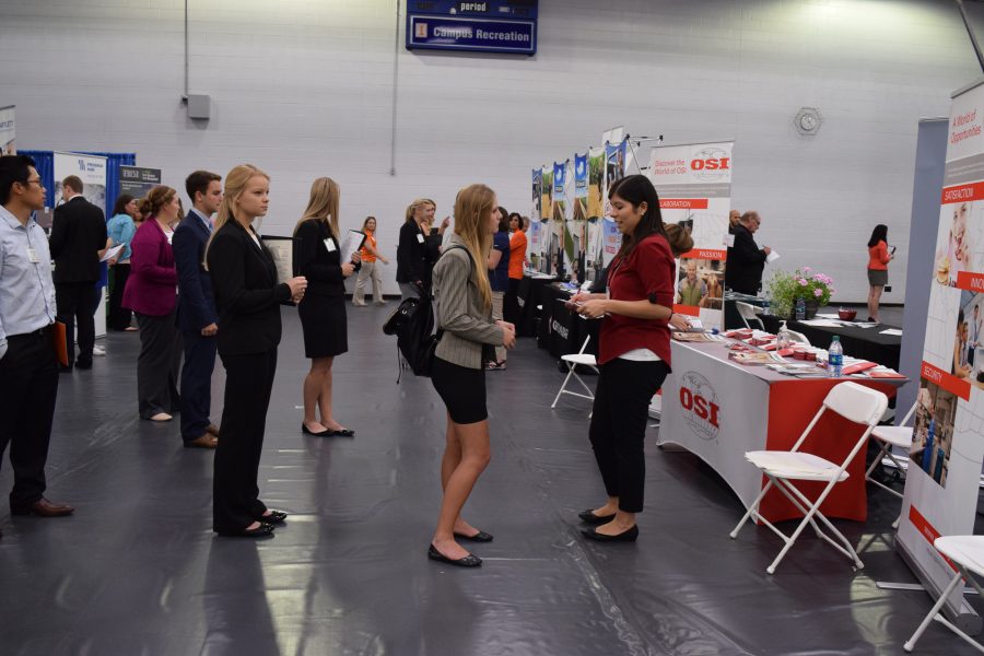 Students wait patiently in line to talk to potential employers at the ACES Career Fair at the ARC on Thursday, October 6, 2016.