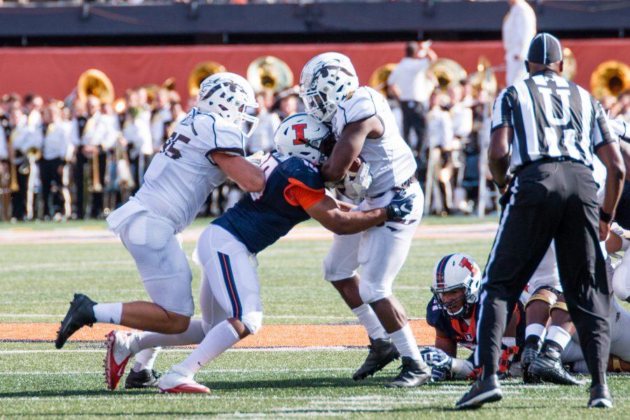 Illinois+linebacker+Hardy+Nickerson+%2810%29+tackles+Western+Michigan+running+back+Jarvion+Franklin+%2831%29+during+the+the+game+against+Western+Michigan+at+Memorial+Stadium+on+Saturday%2C+September+17.+The+Illini+lost+34-10.