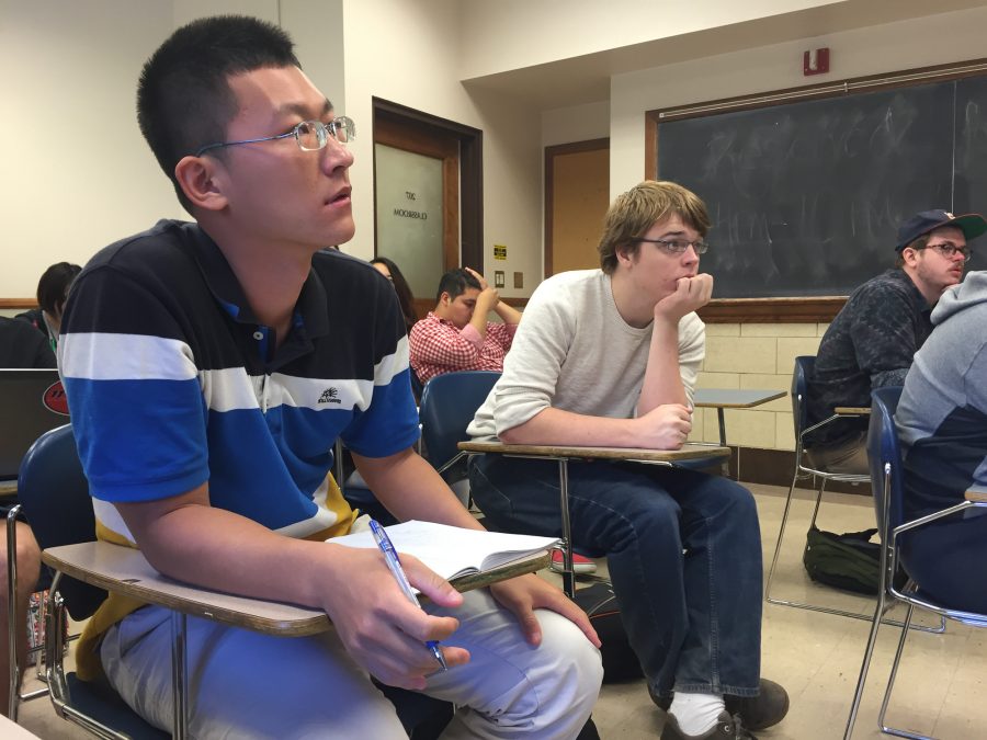 Zeyu Hu, a senior in LAS, listens to history professor Poshek Fu lecture in his Social-Economic History of Modern China class. Fu has changed this course and two others to accommodate international students like Hu, who is from Beijing. 