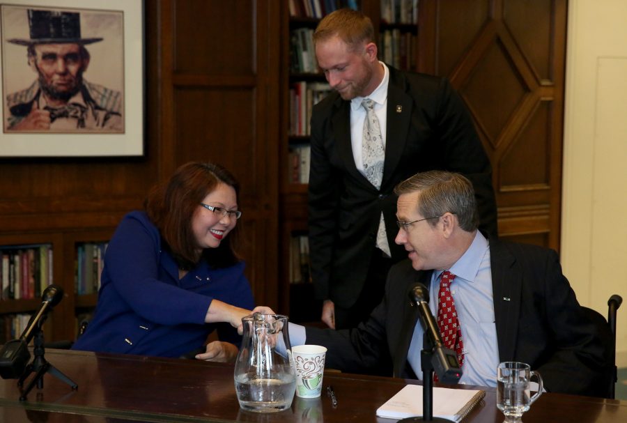 Rep. Tammy Duckworth and Sen. Mark Kirk shake hands after their debate on Monday Oct. 3, 3016 in the Chicago Tribune Editorial Board room. (Nancy Stone/Chicago Tribune/TNS)