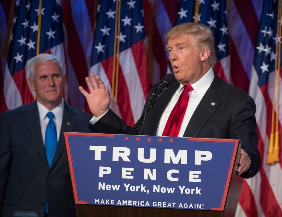 President-elect Donald Trump, joined on stage by running mate Mike Pence, speaks to supporters at the Election Night Party at the Hilton Midtown Hotel in New York City on Wednesday, Nov. 9, 2016. (J. Conrad Williams Jr./Newsday/TNS)