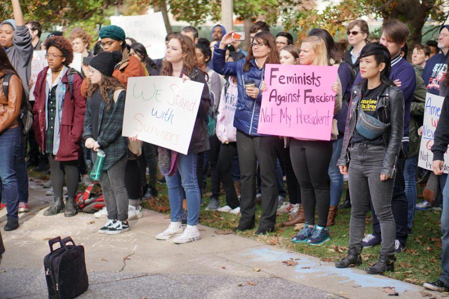 Students protest President -elect Trumps appointment to office at the Alma Matter on Friday, November 11.