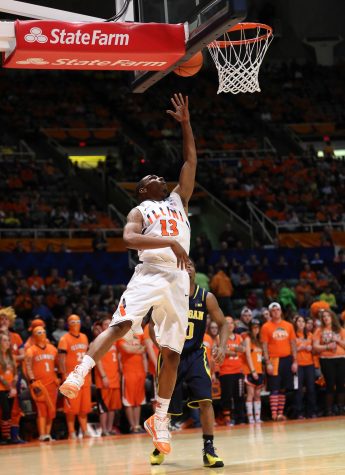 Illinois Tracy Abrams (13) attempts a layup during the game against No. 12 Michigan, at State Farm Center, on Tuesday, March 4. The Illini lost 84-53.