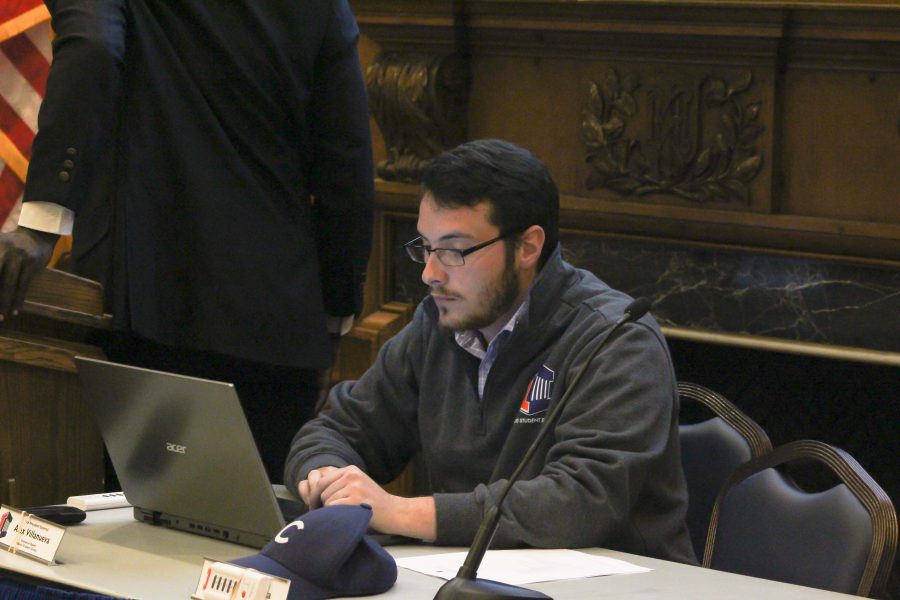 Alex Villanueva prepares for Illini Student Senate Meeting in the Illini Union on Wednesday night. 