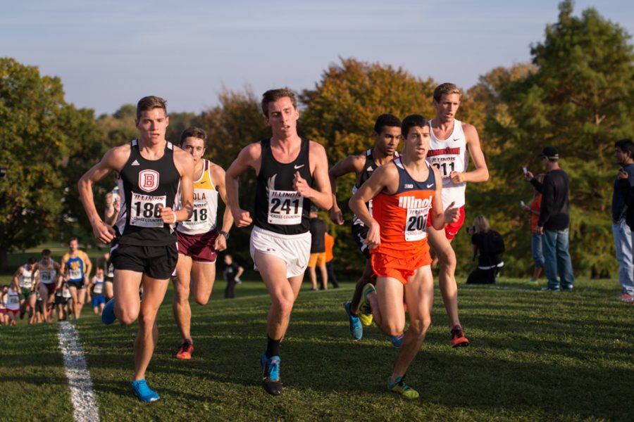 Illinois Alex Gold (207), freshman, keeps pace with his opponents at the Illini Open 2014 at the Arborteum on October 25th.