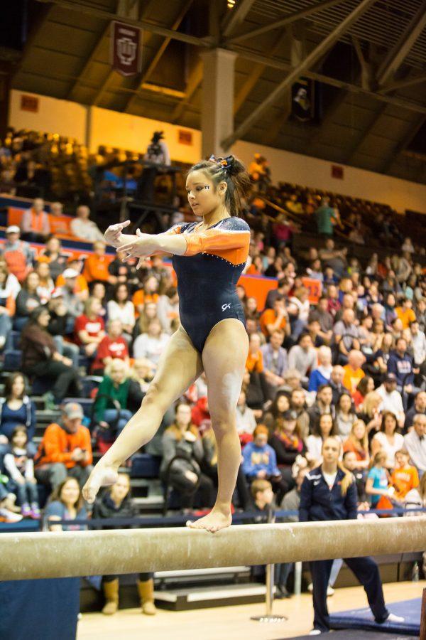 Illinois Lizzy LeDuc performs a routine on the balance beam during the State of Illinois Classic at Huff Hall on Saturday, March 5, 2015. The Illini claimed victory for the ninth consecutive year with a total of 195.425 over Northern Illinois (194.225), UIC(192.625) and Illinois State (191.500).