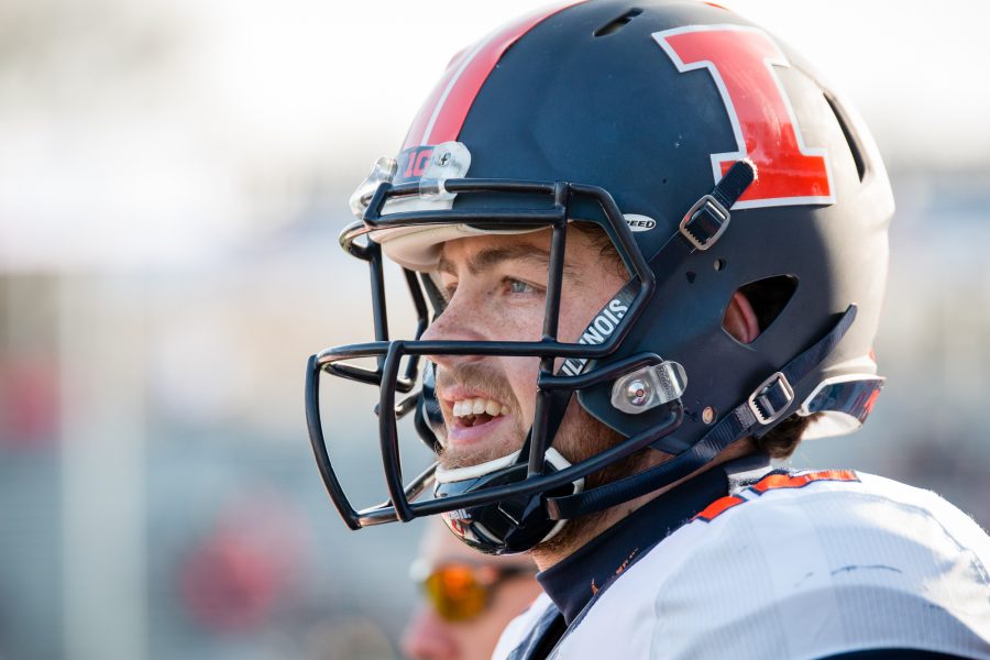 Illinois quarterback Wes Lunt (12) watches from the sidelines during the game against Northwestern at Ryan Field on Saturday, November 26. The Illini lost 42-21.