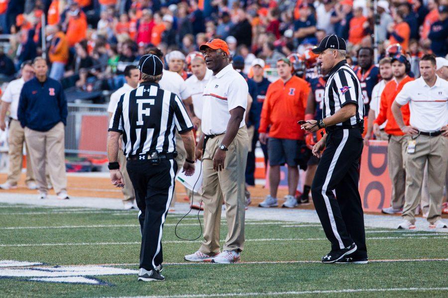 Illinois head coach Lovie Smith talks to the refs after a penalty during the game against Purdue at Memorial Stadium on October 8. The Illini lost 34-31.