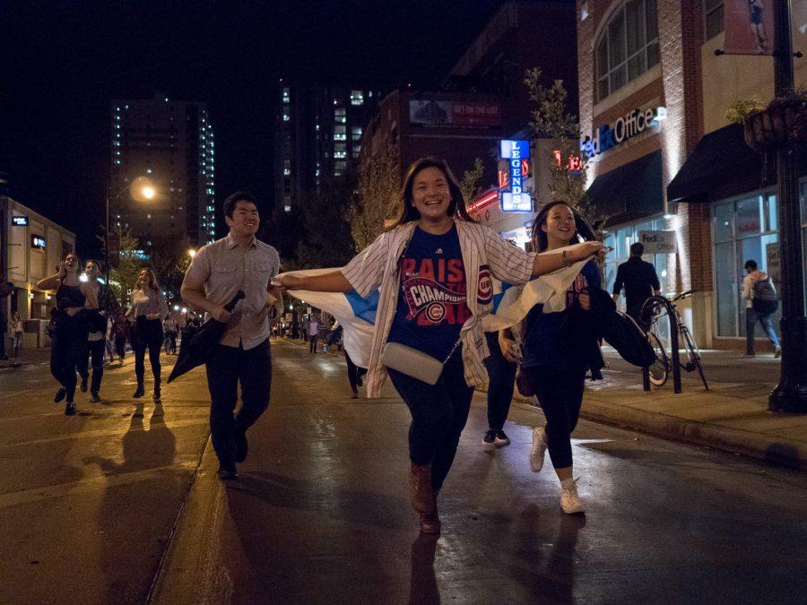 Students celebrate after the Cubs win Game 7 of the 2016 World Series against the Cleveland Indians on Nov. 2 on Green Street.