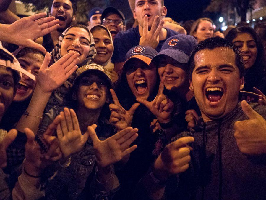 Students celebrate after the Cubs win Game 7 of the 2016 World Series against the Cleveland Indians on Wednesday, November 2 on Green Street at the University of Illinois at Urbana- Champaign.