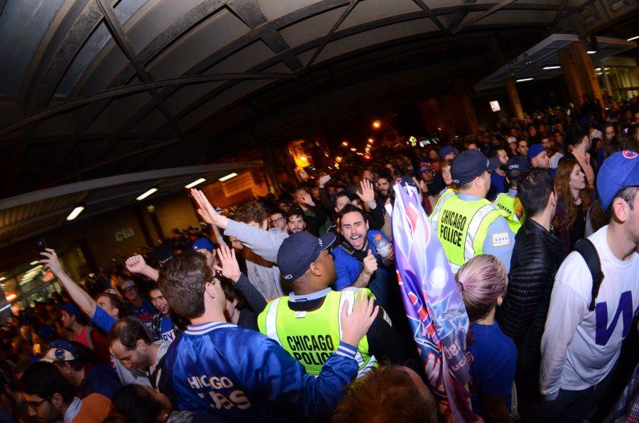 Citizens celebrate in the Wrigleyville streets after the Chicago Cubs win against the Cleveland Indians in Game 7 of the 2016 World Series on Tuesday, November 2 in Chicago.