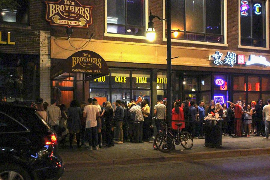 Students wait in line at Brothers Bar.