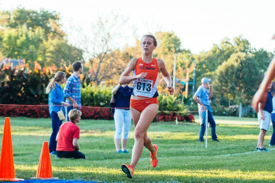 Audrey Blazek crossing the finish line during the womens cross-coutry Illini Challenge. The challenge was held at the UI Arboretum on Friday, September 2, 2016.