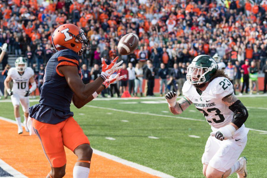 Illinois wide receiver Sam Mays scores a touchdown during the game against Michigan State at Memorial Stadium on Saturday, November 5. The Illini won 31-27