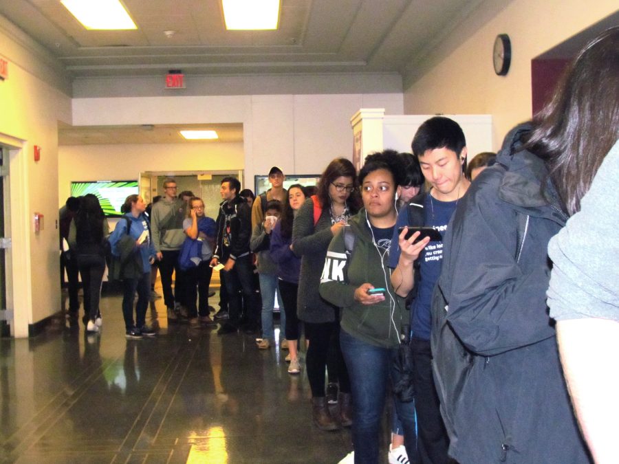 Students lineup at the polls in the Union basement for voting in the 2016 election.