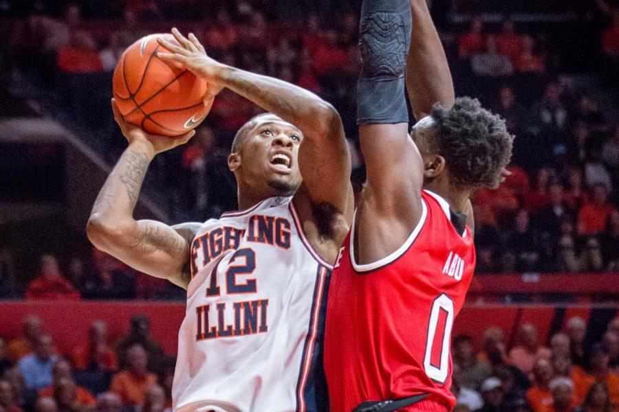Illinois+Leron+Black+%2812%29+goes+up+for+a+layup+during+the+game+against+North+Carolina+State+at+State+Farm+Center+on+Tuesday%2C+November+29.+The+Illini+won+88-74.
