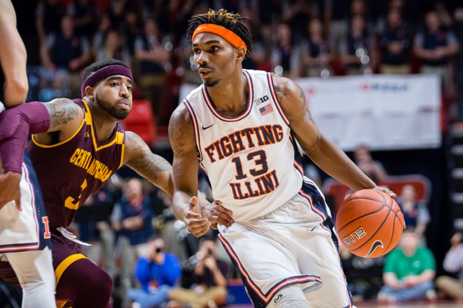 Illinois' Tracy Abrams (13) drives to the basket during the game against Central Michigan at State Farm Center on Saturday, December 10. The Illini won 92-73.