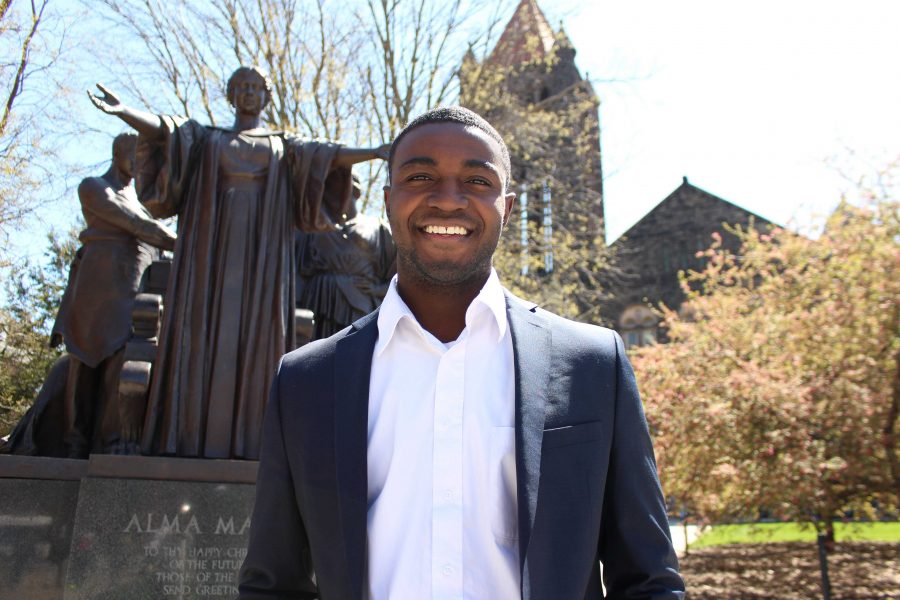Newly elected student body president Ron Lewis in front of the Alma Mater on Wednesday, Apr. 13
