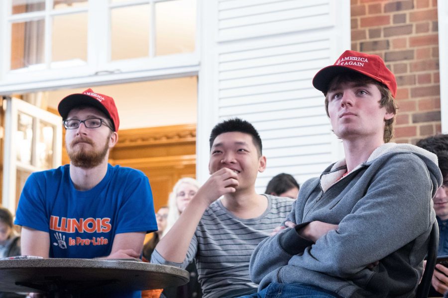 Trump supporters gather in the Courtyard Cafe at the Illini Union to watch the inauguration of the 45th President of the United States, Donald Trump. Columnist Isabella Winkler believes it is crucial to stay critical of the nation’s leaders.