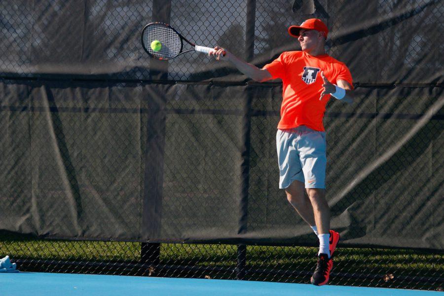 Illinois Aron Hiltzik (So.) hits the ball back during the game against Michigan State at Atkins Tennis Center on Friday, Apr. 15, 2016. The Illini won 4-0.