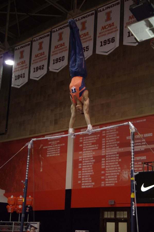 Illinois Chandler Eggleston performs his routine at the meet against Michigan on March 12, 2016.