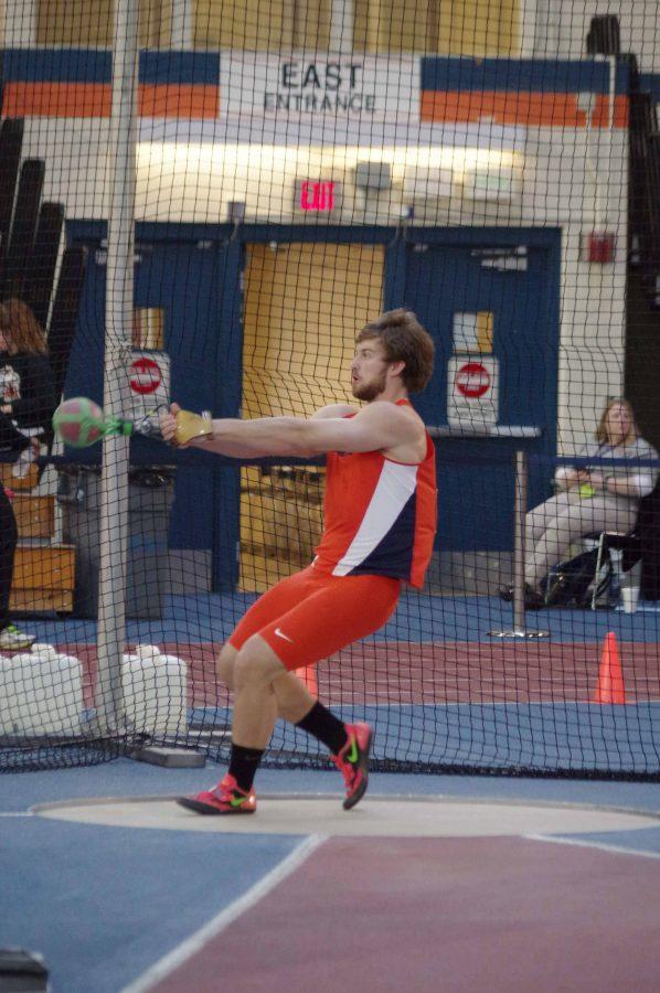 Illinois Micheal Hyc winds up during the weight throw in the Orange & Blue Meet at the Armory on Saturday Feb. 20, 2016.