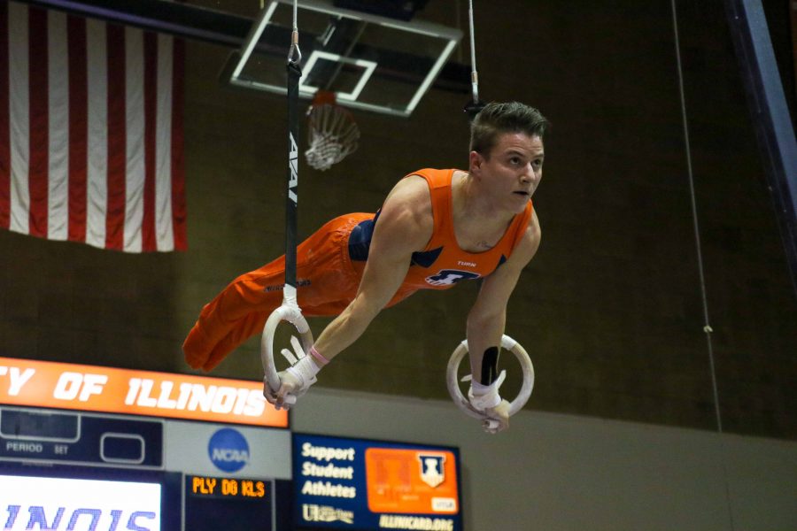 Brian Bauer The daily Illini
Illinois’ Bobby Baker works the still rings in the meet against Minnesota at Huff Hall on Saturday.