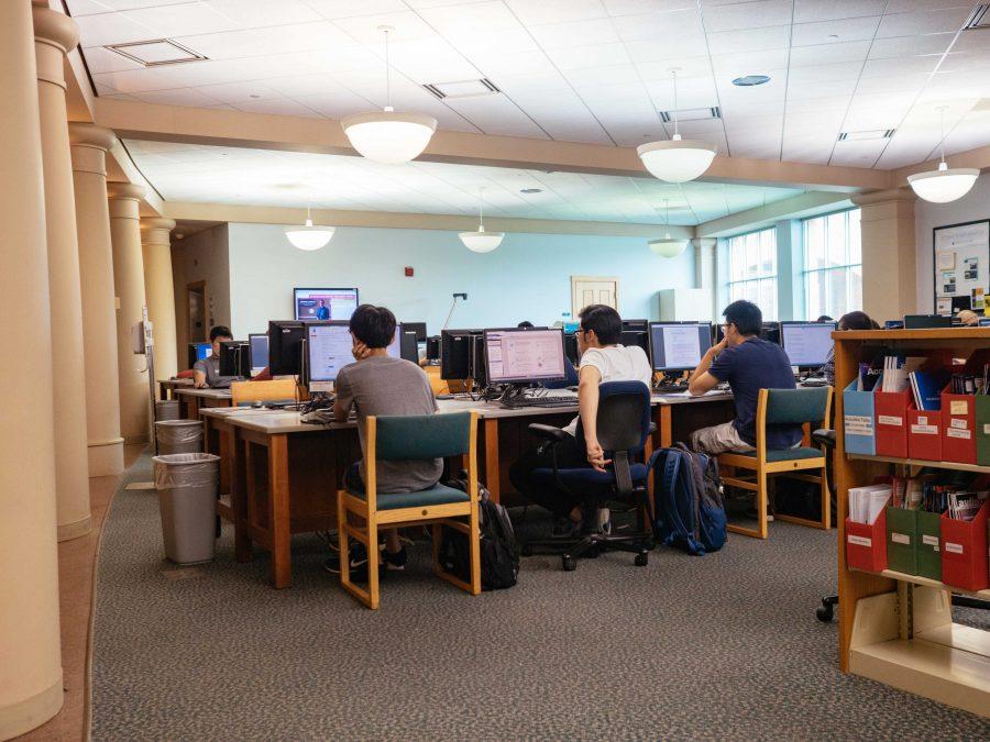 Students spend time in Grainger Engineering Library working on the computer. 